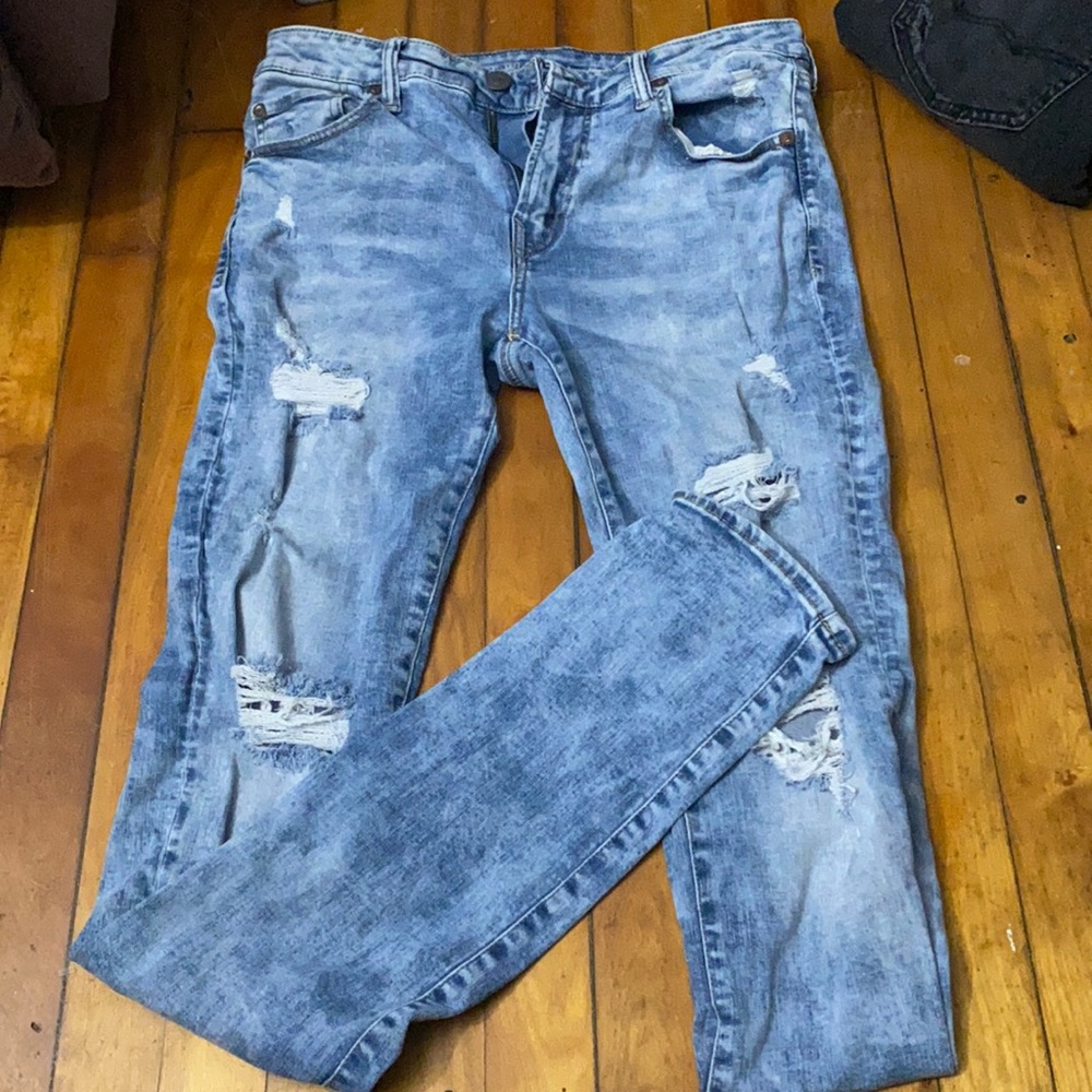American Eagle x Young Money ripped jeans